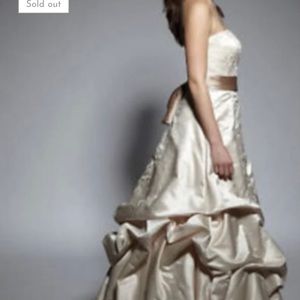 Oleg Cassini champagne with beige sash elegant ruffle and train.